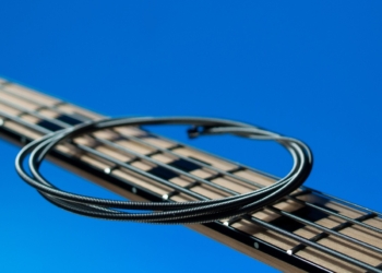 changing strings is the first part of a bass guitar setup