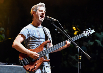 Phish bassist Mike Gordon playing bass during their 2025 summer tour