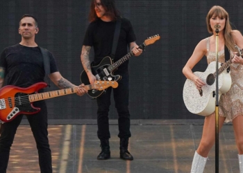 Amos Heller bass player with Taylor Swift on stage